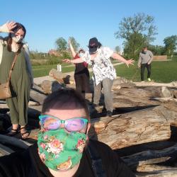 Image of four people playing at a park