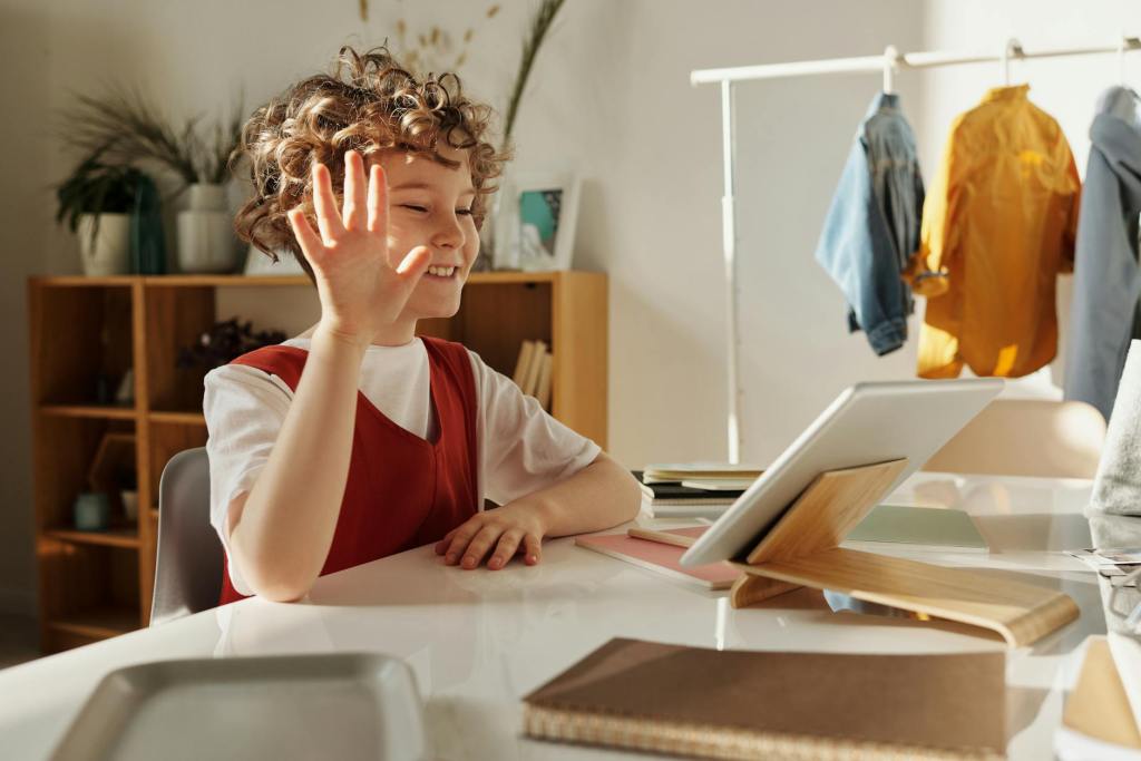 child waves to a electronic tablet to join an online meeting